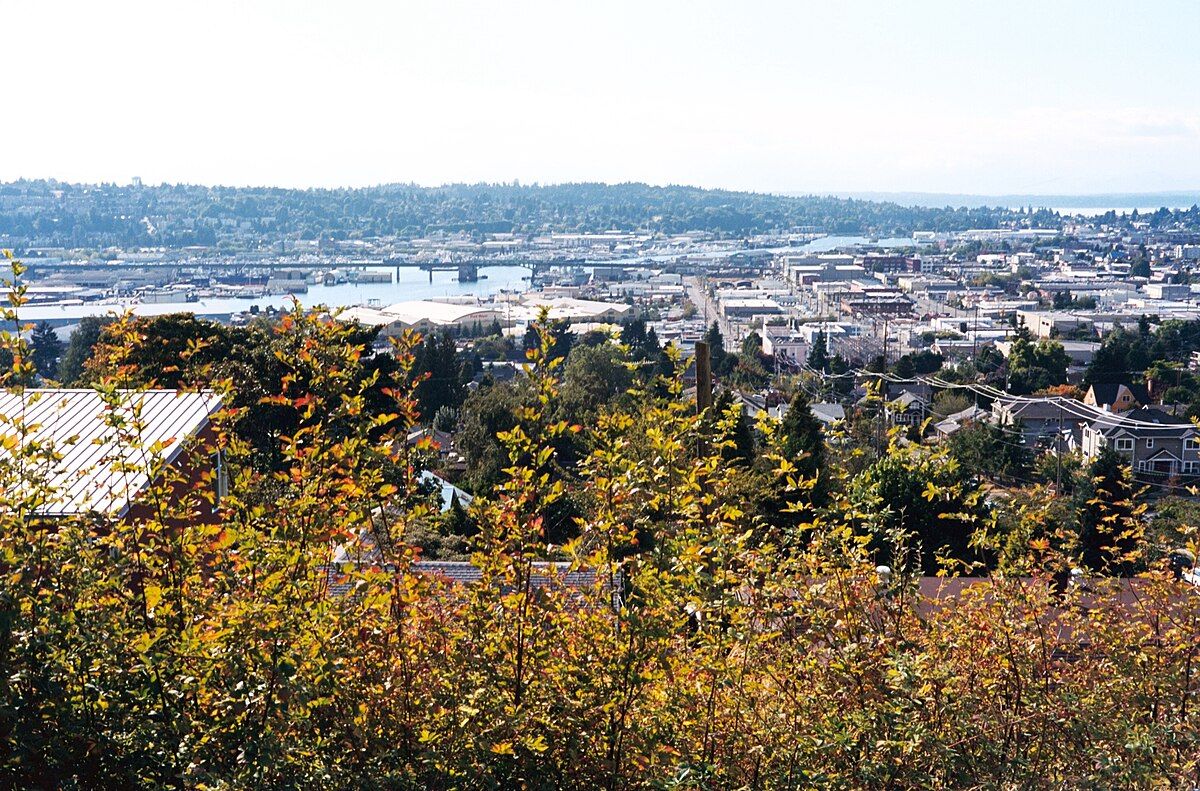 The view north over Salmon Bay and Ballard from Fremont Peak Park, with the Olympic foothills in the distance.